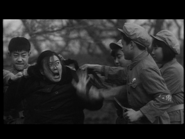Teacher attacked by Red Guards B&W